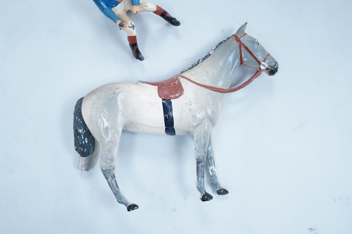 Two boxed Britains Racing Colours of Famous Owners series lead mounted figures; Lord Astor - rider in blue jersey with a pink sash on a grey horse (one leg broken and missing), and. the Duke of Norfolk - rider in blue je